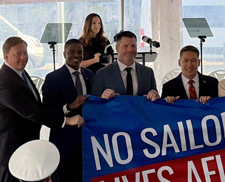 Newport News Mayor Phillip Jones, Hunt Military Communities President Brian Stann and Acting Navy Secretary Hung Cao announce a deal to allow Hunt to run the barracks in Hampton Roads.