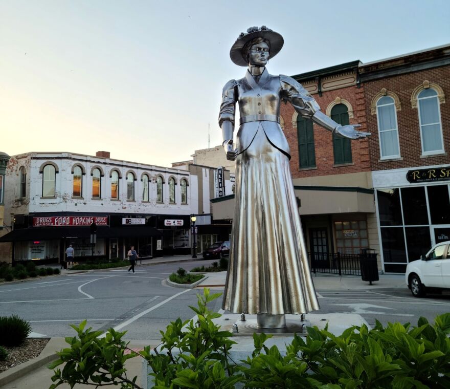 The Lizzie Magie sculpture on Macomb's courthouse square.