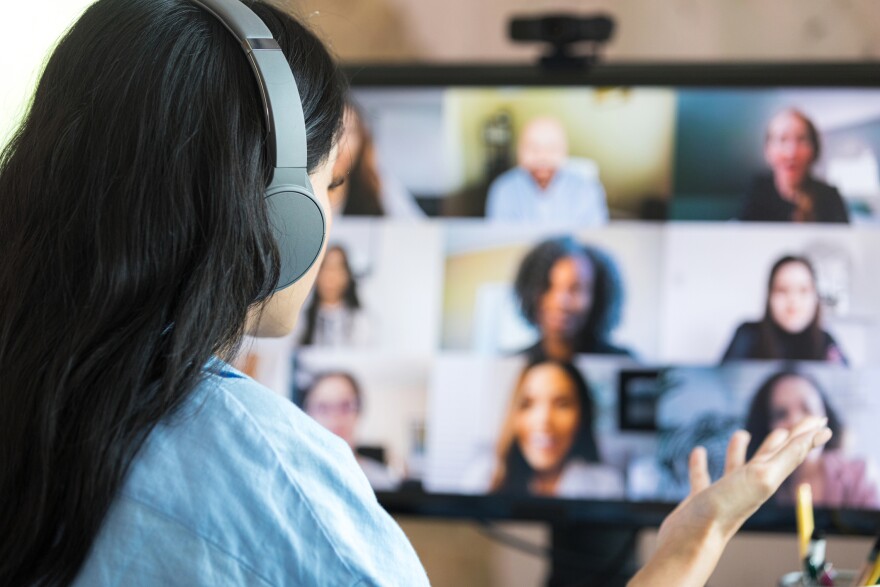 Woman gestures during video call