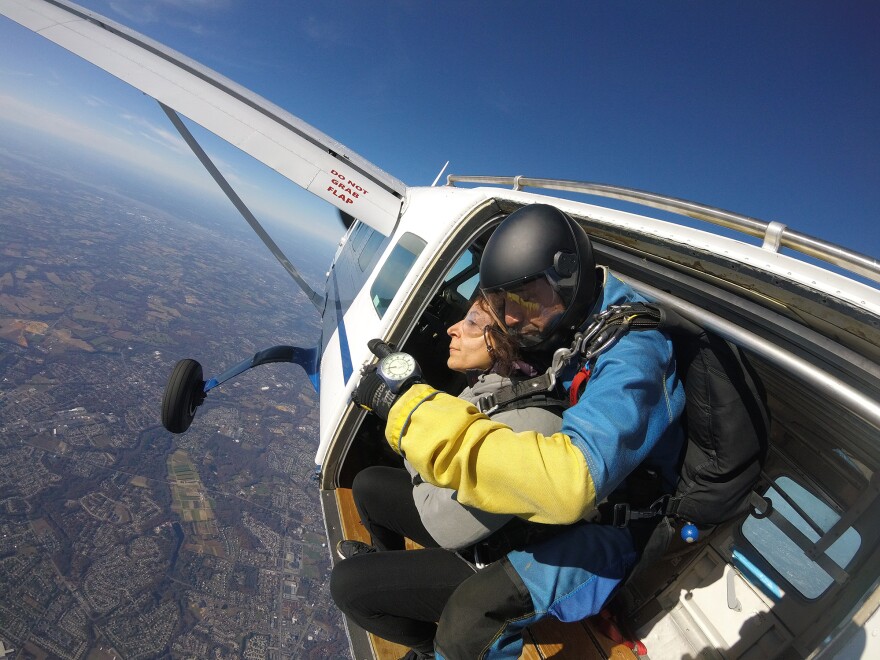 Hanna prepares to jump from the plane.