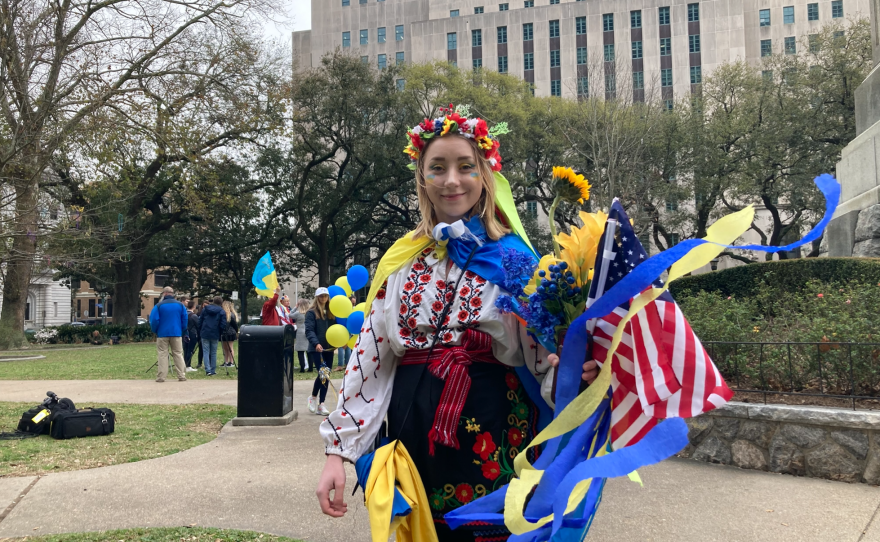 Anna Kushnir, a native of Khmelnytskyi, Ukraine, began the protest by singing the Ukrainian National Anthem