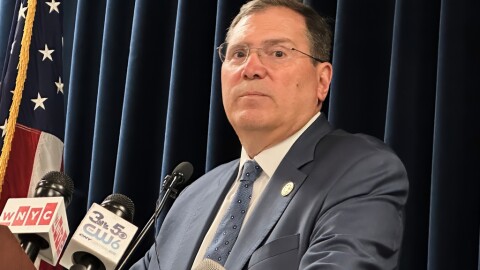 John Sarcone, acting U.S. attorney for northern New York, speaks at a news conference after an immigration raid in Albany, NY, Sept. 9, 2025. (AP Photo/Michael Hill)