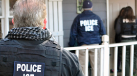 ICE officers making an arrest. 