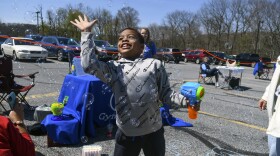 Blake Johnson, of Frackville, Pa., catches bubbles at the Gym-Jam Therapeutics stand during the Stand Out and Shine: Autism Awareness Festival at the Schuylkill Intermediate Unit 29 in Mar Lin, Pa., on Saturday, April 30, 2022. The event was hosted by Dustin's Adventureland and IU 29. (Jacqueline Dormer/Republican-Herald via AP)