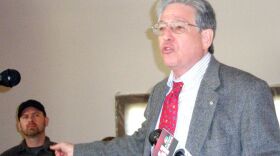 Human rights activist Leonard Zeskind in front of Occupy KC members.
