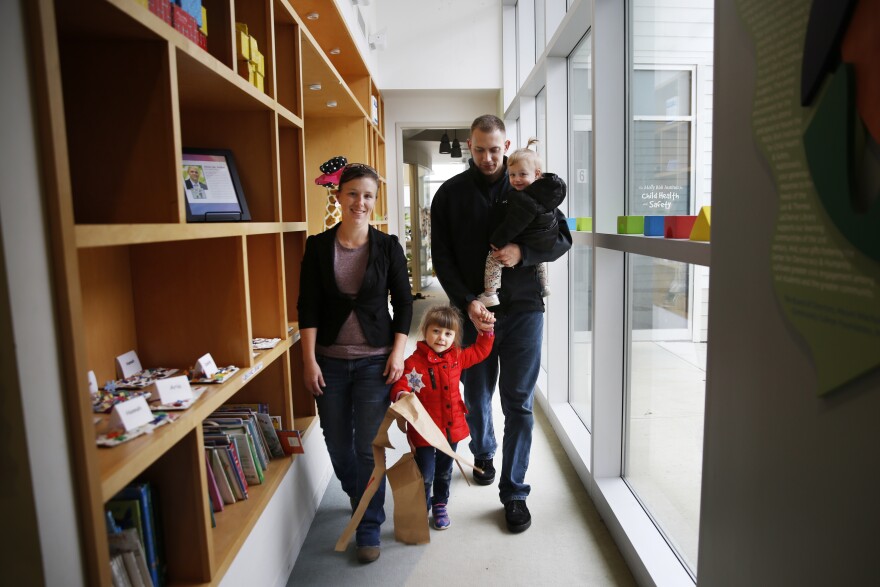 Kate Hough is working toward a nursing degree while raising two toddlers (Nova, center, and Winter, right) and two elementary schoolers with her husband, Joshua.