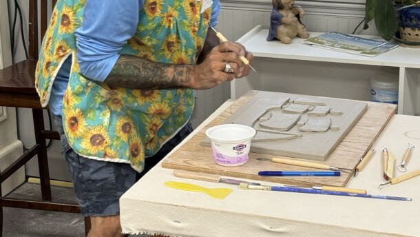 Indian River Clay student Milan Kalelkar listens to music while working on a project during an Independent Study class.