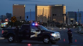 Police form a perimeter around the road leading to the Mandalay Hotel after a gunman killed at least 50 people and wounded more than 400 others when he opened fire on a country music concert in Las Vegas on Oct. 2, 2017. (Mark Ralston/AFP/Getty Images)