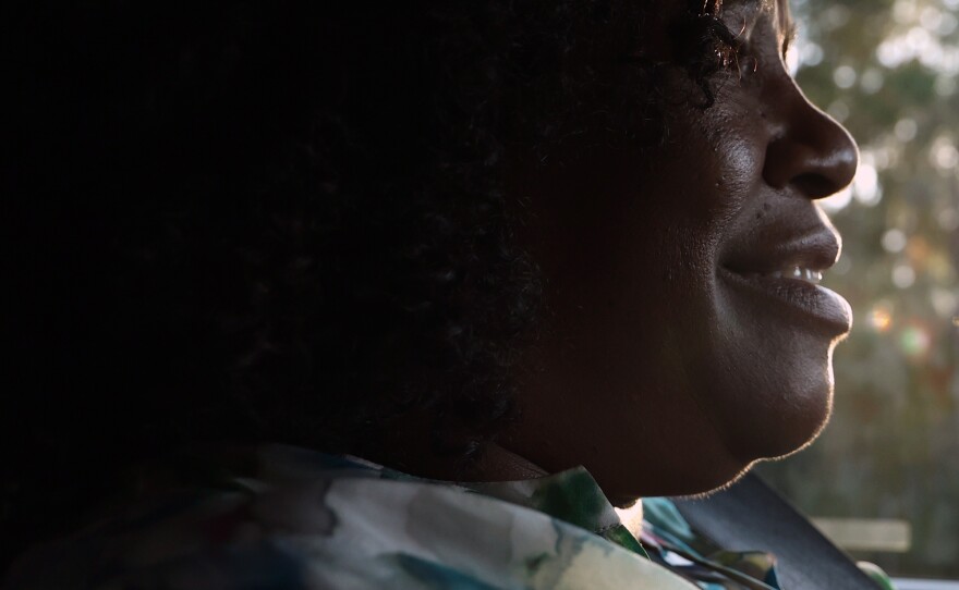 Jaquelyn “Jackie” King, a rideshare driver for the company Uber, drives the tree-lined streets of Gainesville, Fla., on Thursday, Nov. 20, 2025.