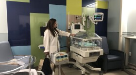 The medical director for neonatology, Dr. Arlene Boykin, shows off the features of the new neo-natal intensive care unit, or NICU. The incubator beds, called isolettes, are an upgraded version from the ones on the current floor.  