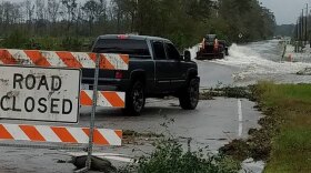 A truck tries to make its way to Wilmington on Sunday, Sept. 16 despite a road closure. 