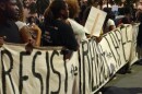 Demonstrators line up by the convention center.