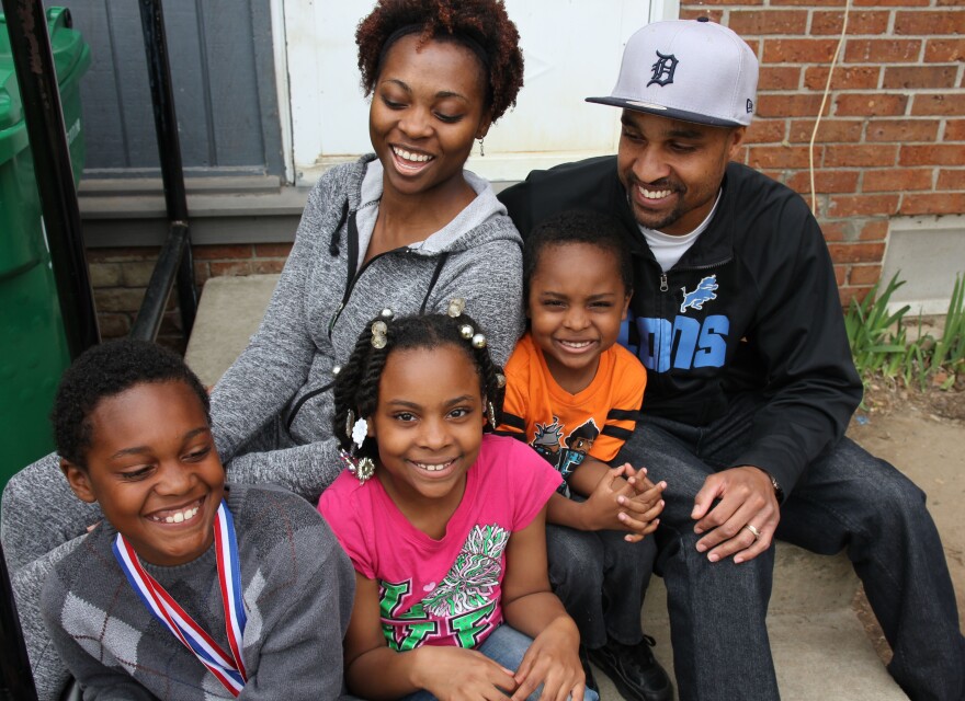 A family photo of Justice, his siblings and parents