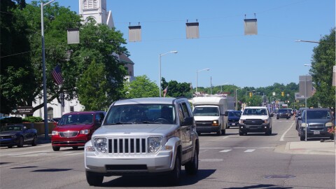 A photo of a traffic running down Michigan Avenue crossing Rose Street in downtown Kalamazoo.  