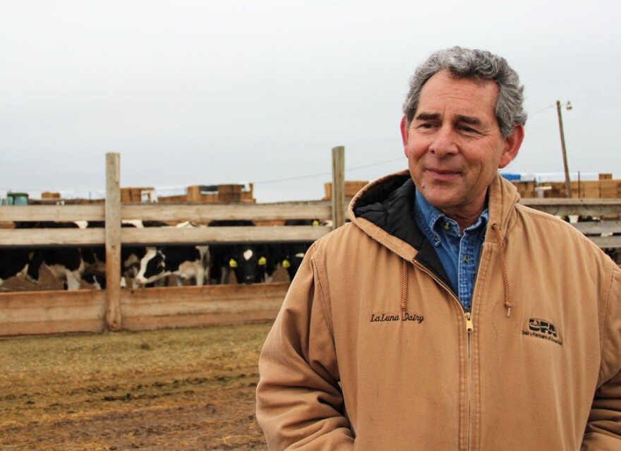 Jon Slutsky and around 50 other farmers signed up for a voluntary program where they get an alert when the winds are blowing the wrong way and a system is likely to move in and rain nitrogen down on the park.