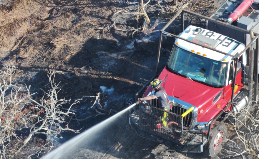 Lehigh Acres Fire Control and Rescue District working a brush fire off state Route 82 on Friday.