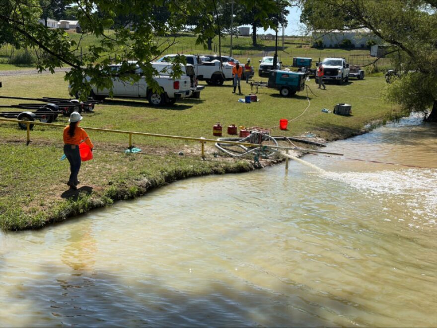 After the spill, remediation teams work to increase the pH of the stream on May 13, 2026.