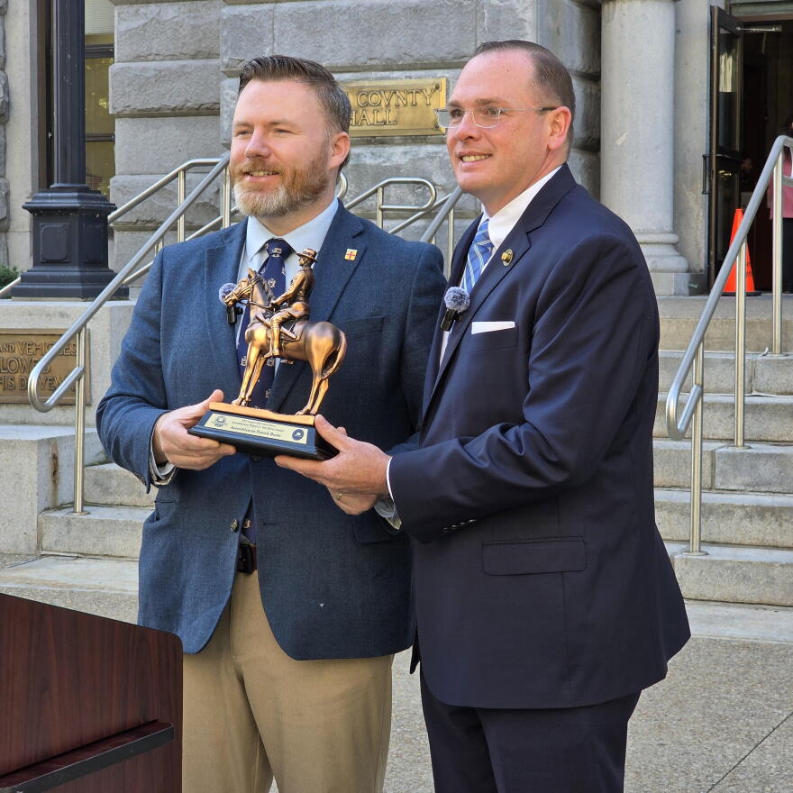 New York State Troopers Police Benevolent Association President Charles Murphy presents Assemblymember Patrick Burke with an award recognizing his work to advance the state’s new critical incident leave policy for troopers.