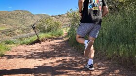 Jake Esayian jogs on the Bonneville Shoreline Trail in Salt Lake City, May 10, 2026. Research has shown a deepening disconnect for men and boys on things like finding community and overall belonging. Despite its outdoorsy reputation, finding your tribe for activities in Utah can be harder than you think.