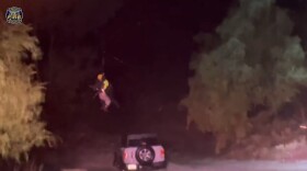 A helicopter crew rescued a motorist stranded by flooding northeast of Ojai Friday night.