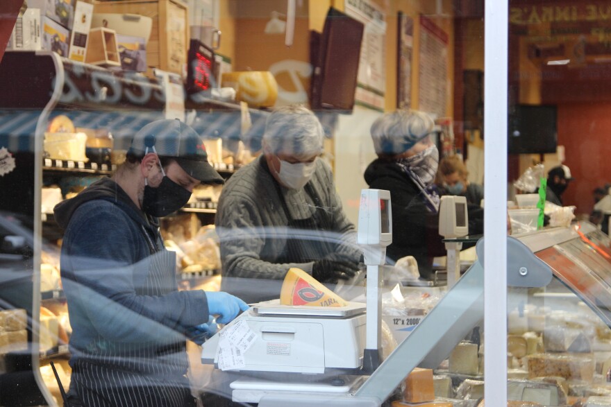 through_the_window_penn_mac_cheese_counter_masks_grocery_shopping.jpg