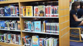 Students sit in the school library at Eisenhower International School in Tulsa on Oct. 2.