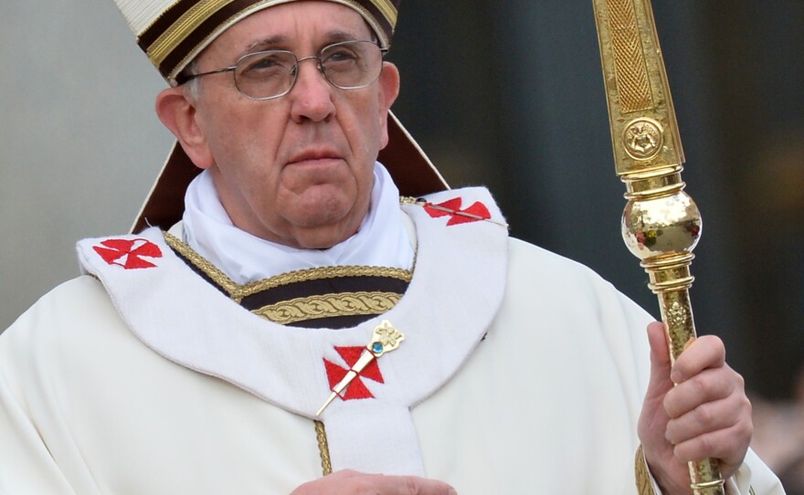 Pope Francis wore a cream-colored chasuble with gold trim to celebrate the Easter Mass on March 31, 2013, at the Vatican. This particular papal ferula features a sheep, driving home the symbolic reference to the pope as shepherd.