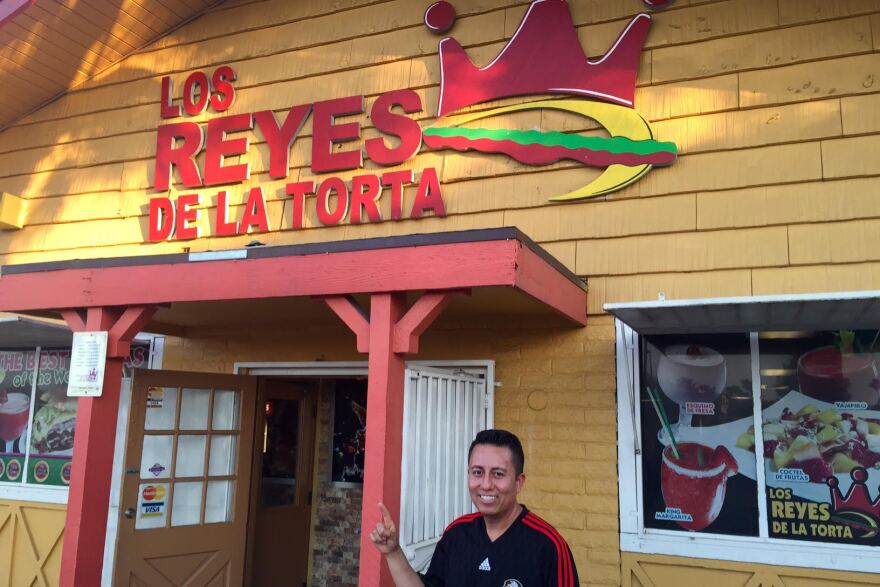 Eloy de la Torre owns Los Reyes de la Torta. He said it was busy before the match between Mexico and Uruguay, and expected it to be pick up again afterward.