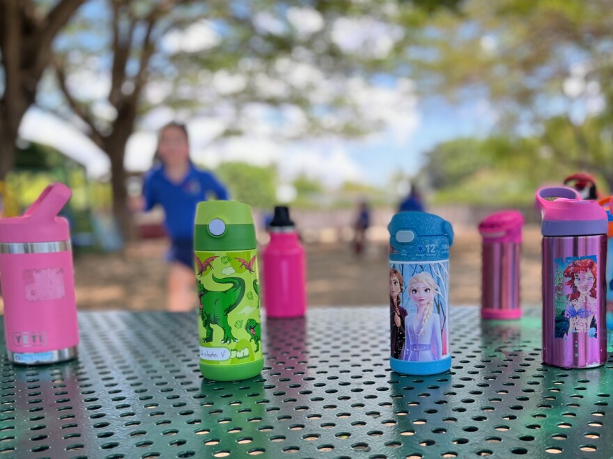  Water bottles on a playground table at The Creative Learning Center preschool in West Kendall on Apr. 28, 2022. The school has closed three of its classrooms because of a shortage of teachers.