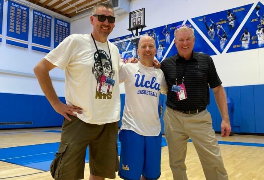 Mark Slaughter and WLWT-TV sports director George Vogel (right) with UCLA basketball coach Mick Cronin in Los Angeles.