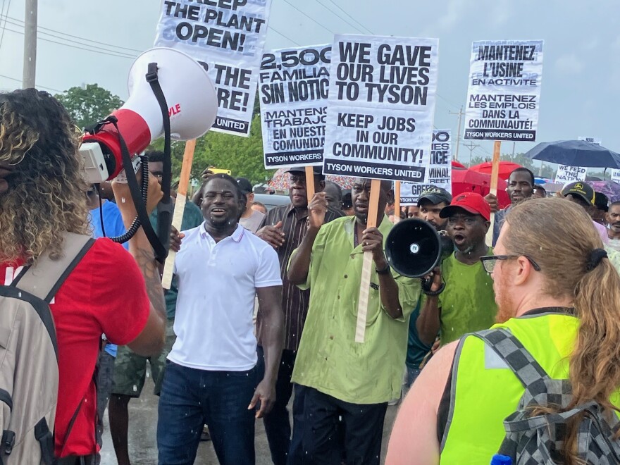 Newly unemployed Tyson workers march and protest for their jobs outside the Joslin plant on Friday afternoon.