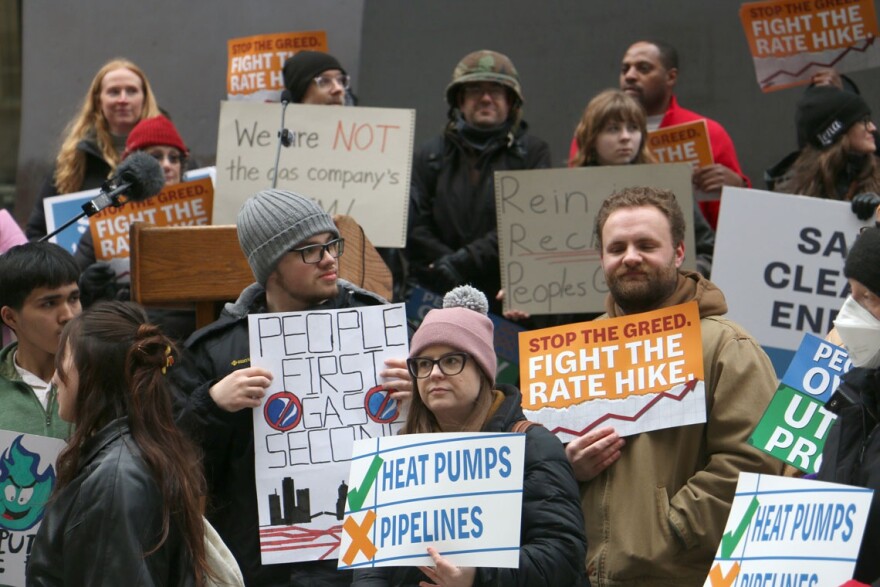 Customers and utility watchdogs took to Daley Plaza with signs and chanting to denounce Peoples Gas’ January rate hike request. The April 1, 2026, demonstration drew over 100 participants. 