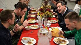 Sen. Joe Donnelly visits with Hoosier service members aboard the USS Truman in the Persian Gulf.