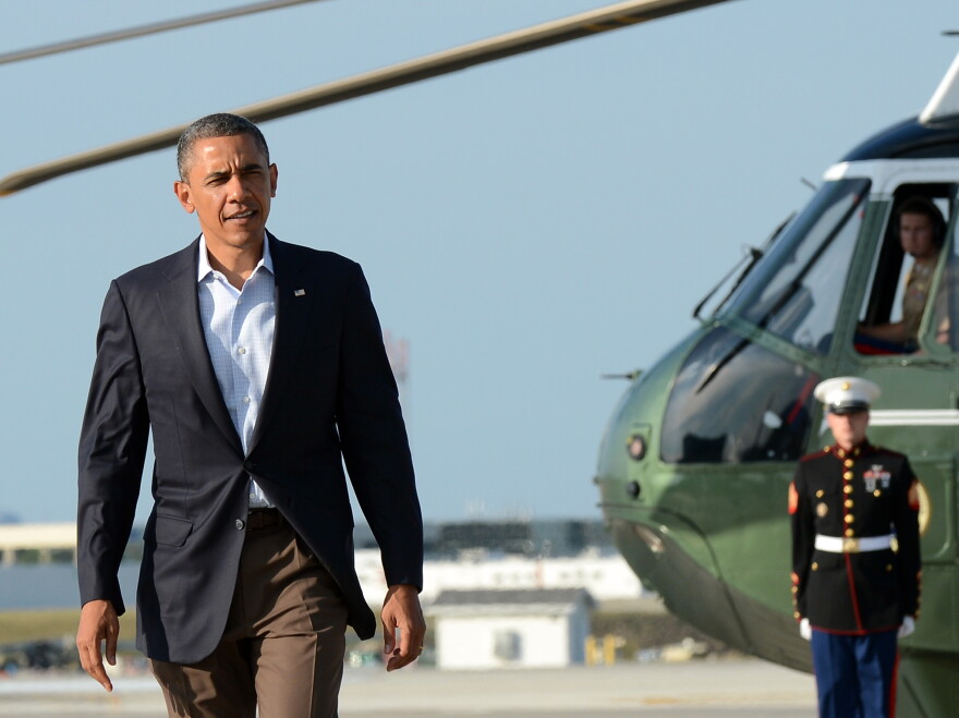 President Barack Obama arrives to board Air Force One at the O'Hare International Airport in Chicago, Illinois, on June 17, 2012 to leave for Los Cabos, Mexico to attend G20 summit. The leaders of the world's most powerful economies meet Monday for a G20 summit confronted by turmoil in the eurozone, a critical election in Greece and worsening bloodshed in Syria.