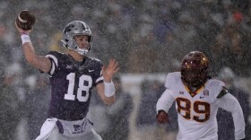 Kansas State quarterback Will Howard (18) throws a pass.
