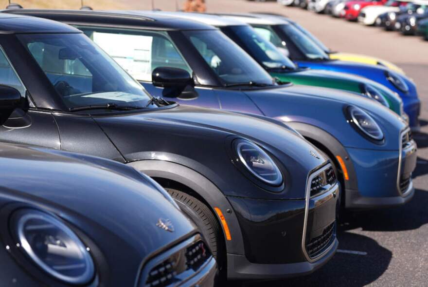 Unsold 2026 Cooper hardtops sit in a row at a Mini dealership Monday, Nov. 10, 2025, in Highlands Ranch, Colo. (David Zalubowski/AP)