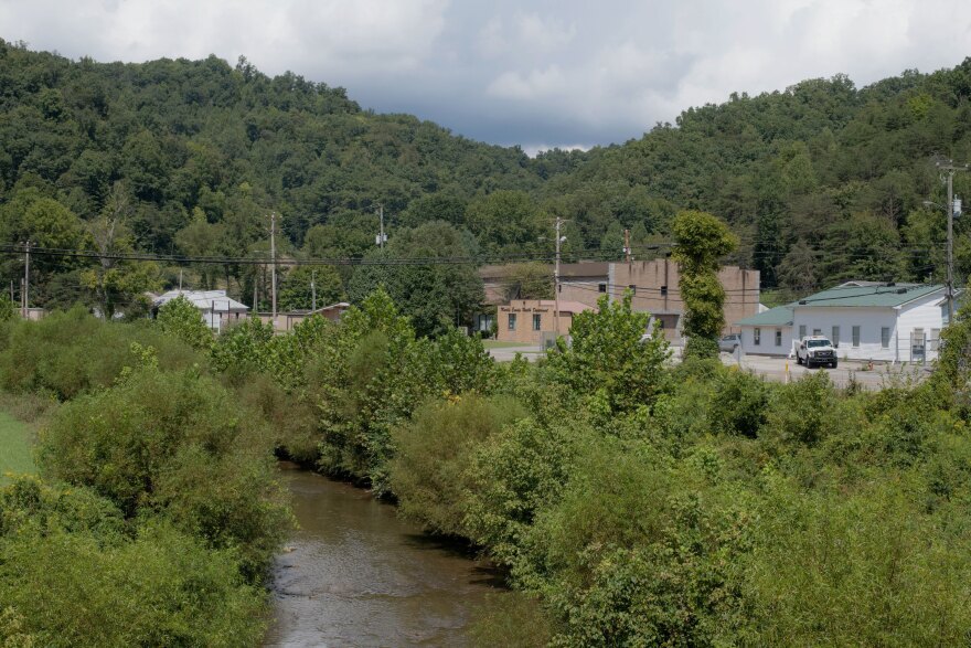 Rockcastle Creek flows past residential homes and businesses along Route 3 in the town of Inez, the county seat of Martin County, Ky. A giant coal sludge spill in October 2000 contaminated the county's rivers for miles, and locals still don't trust the water.