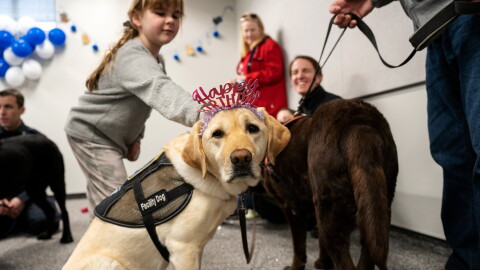 K-9 Chase is all dressed up for Hodges’ birthday party. Chase is also a Puppies Behind Dog and works with Officer Heather McClelland in the Groton Police Department. McClelland was the first officer in Connecticut to receive a dog from the Puppies Behind Dog program