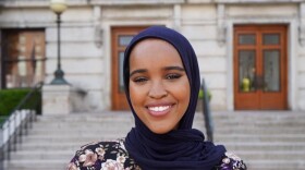 Munira Abdullahi stands in front of the Ohio Statehouse  