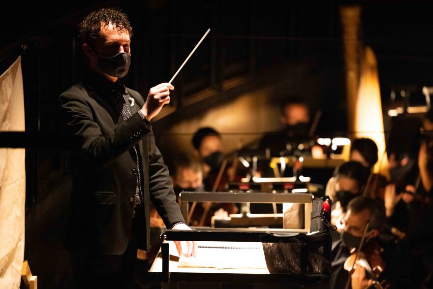 Ballet West music director Jared Oaks conducting the Ballet West Orchestra.