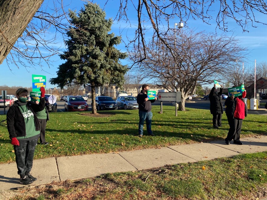Unionized Red Cross blood collection workers picket for more safety precautions and quarantine pay outside the Peoria blood donation center on Thursday, Nov. 12, 2020.