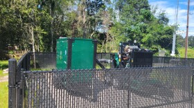 Stormwater pumps on NW 98 St. just outside of the Hills of Santa Fe subdivision. (Jack Lemnus/WUFT News)