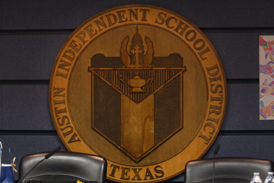 The seal that hangs in the Austin ISD board of trustees room