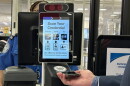 person scans mobile id from phone at TSA checkpoint