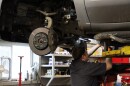 A mechanic works on a vehicle at Weed Family Automotive, a service shop in Concord.
