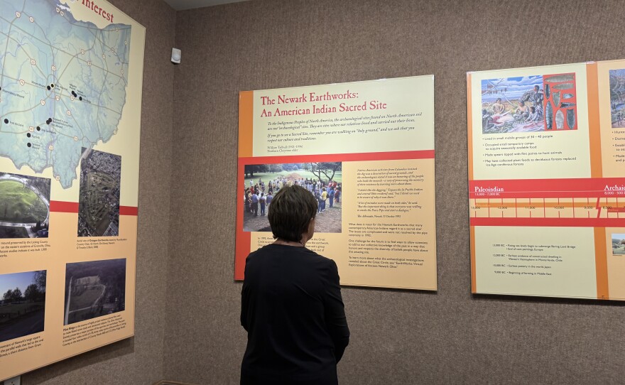 Eastern Shawnee chief Glenna Wallace looks on at a display about the Newark Earthworks.