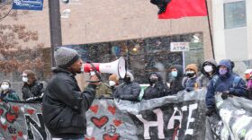 During a pro-police rally in March, counter-protesters gather on the Ithaca Commons.