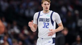 Dallas Mavericks forward Cooper Flagg (32) runs the court in the first half of an NBA basketball game against the San Antonio Spurs Thursday, Feb. 5, 2026, in Dallas.