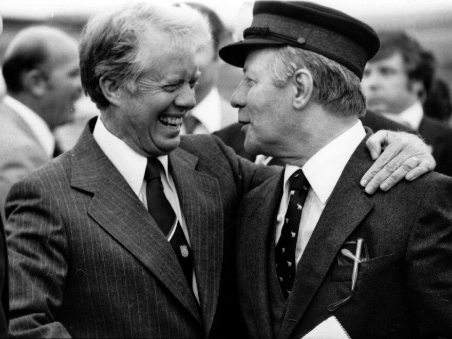 President Jimmy Carter and West German Chancellor Helmut Schmidt prepare to depart Berlin in July 1978. Although Schmidt spoke English well, he needed an interpreter's help when he was tired.