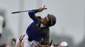 Jockey Junior Alvarado celebrates after riding Sovereignty to victory in the 151st running of the Kentucky Derby horse race at Churchill Downs Saturday, May 3, 2025, in Louisville, Ky. (AP Photo/Brynn Anderson)